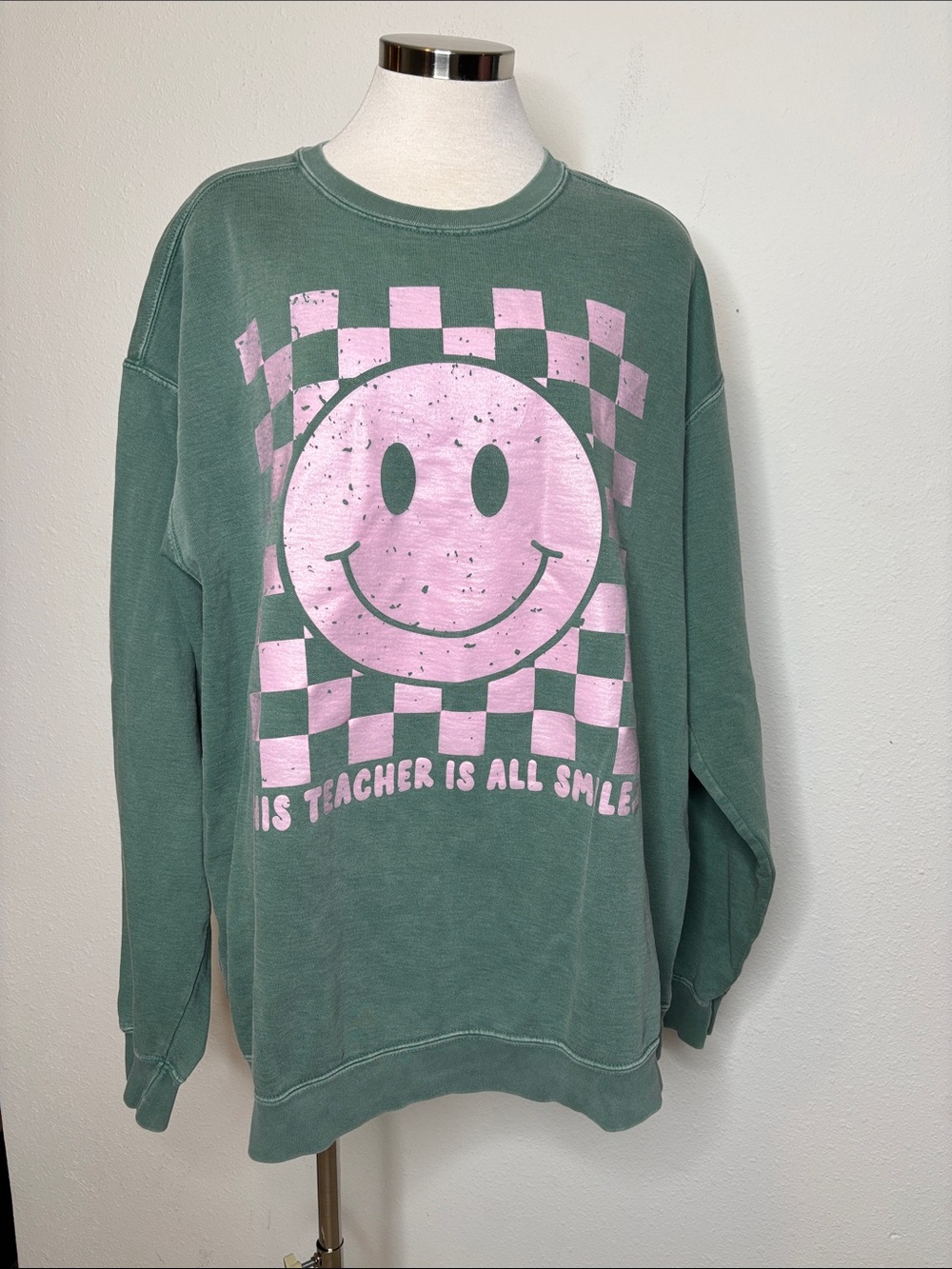 Green Sweatshirt with Pink Smile Graphic